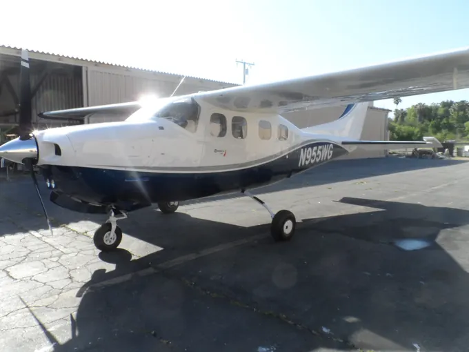 Blue-and-white high-wing Cessna